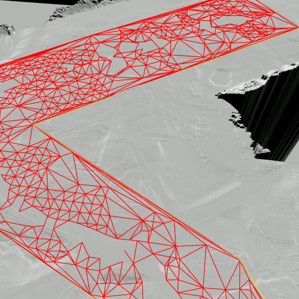 Triangulated surface model wireframe of a stockpile area