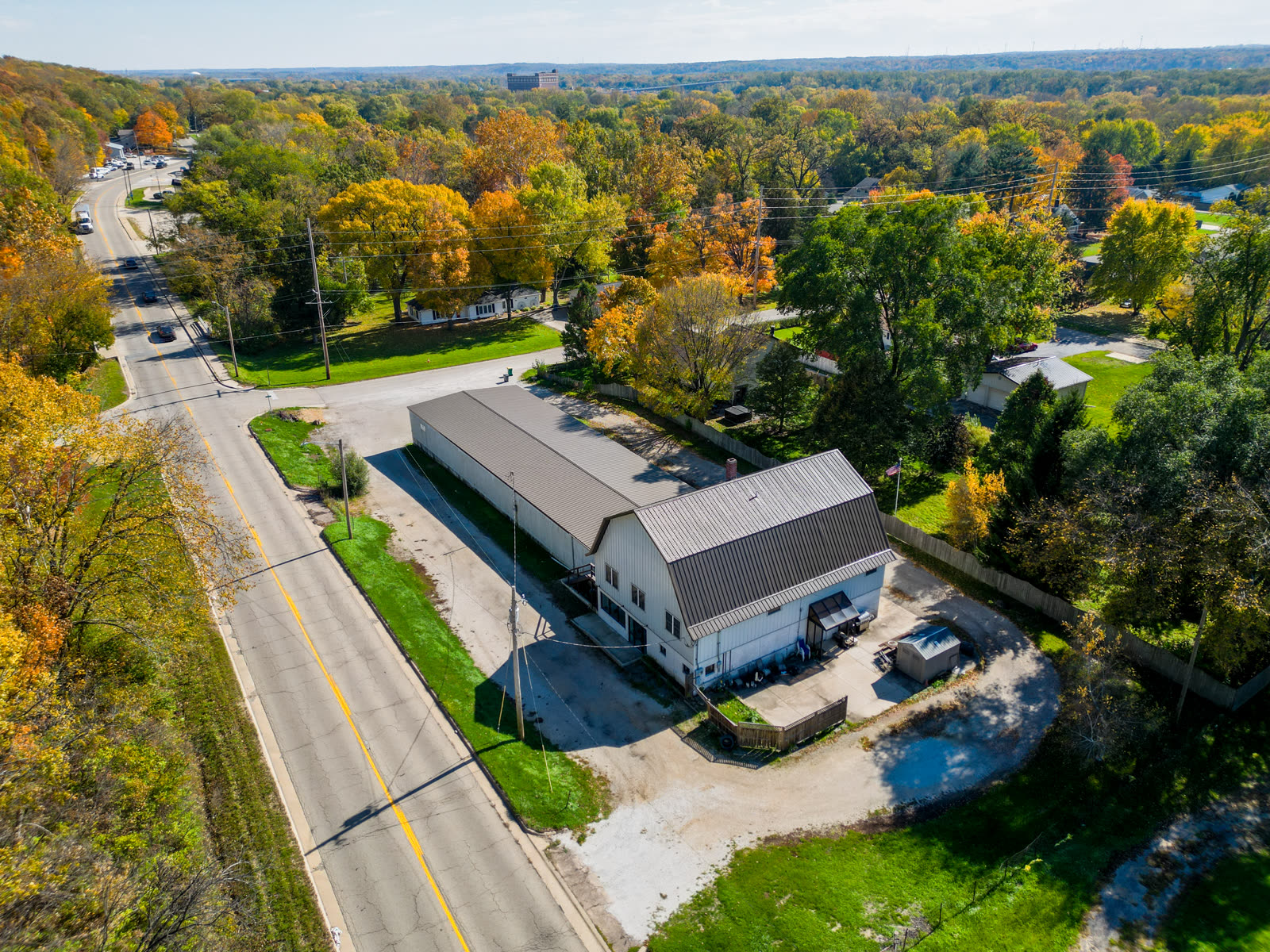Aerial imagery of a tree-lined street in autumn