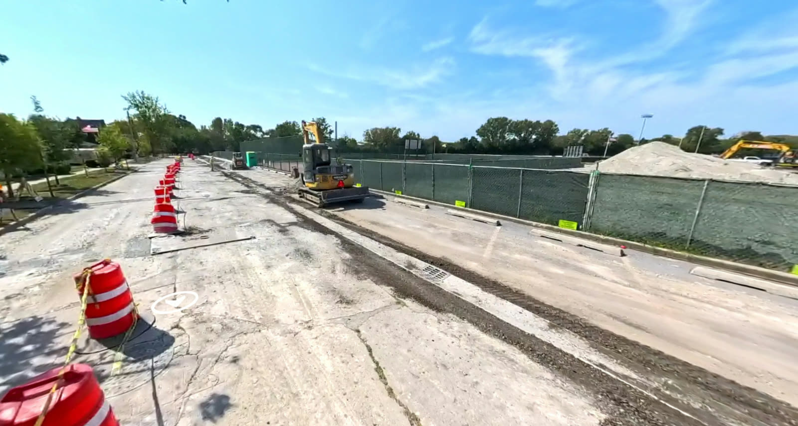 Roadway construction corridor with heavy equipment during a mapping flight