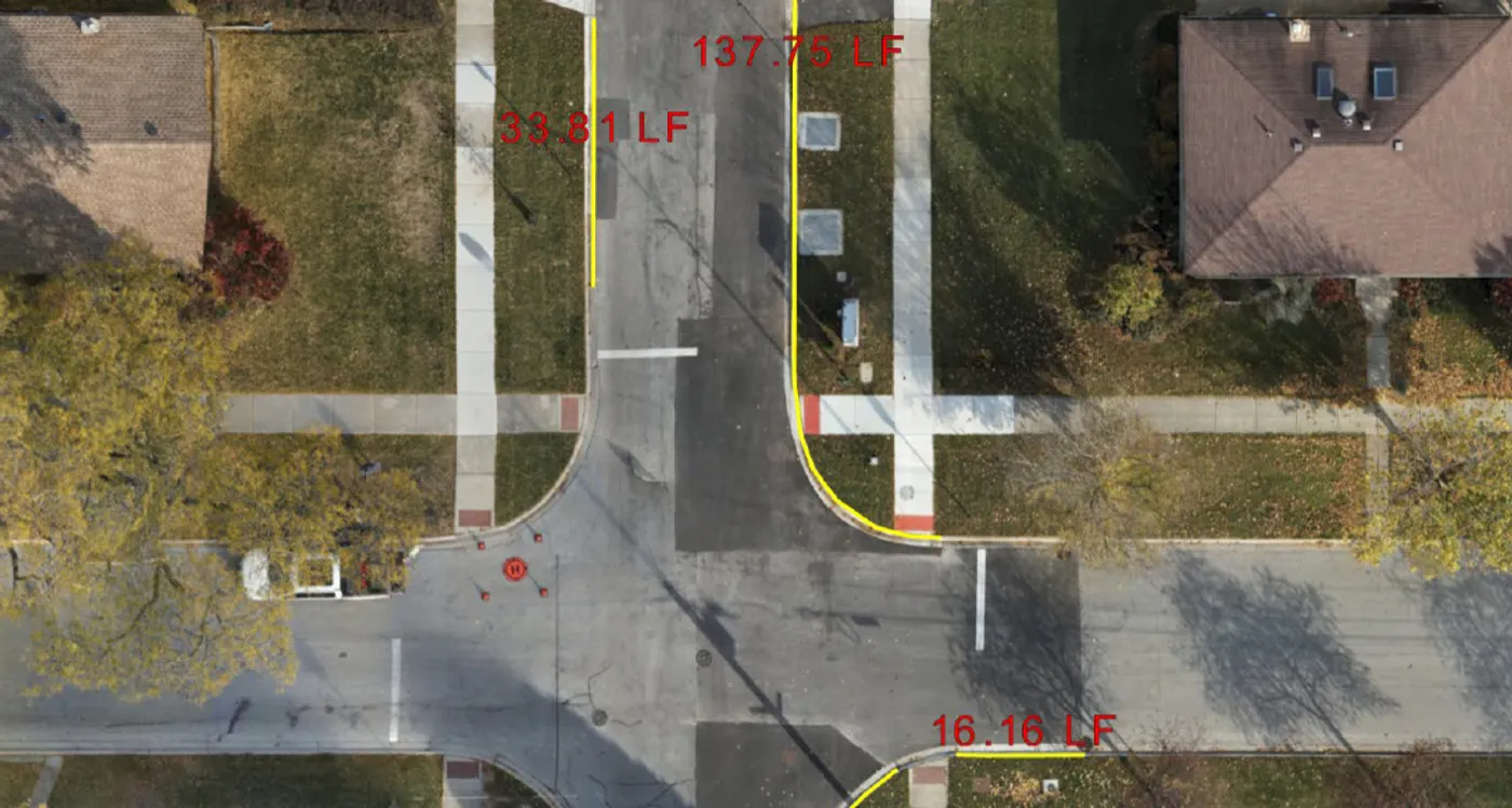 Measurement map marking new asphalt, curbs, sidewalks, and driveways